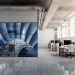 Blue and white decal of office chairs at a table on a wall in an office. 