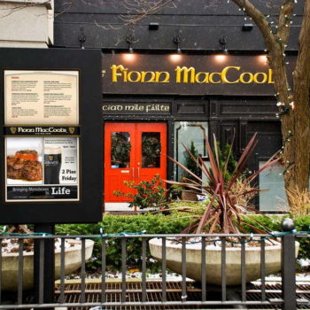 Outdoor standing interchangeable digital menu and specials board for an irish pub