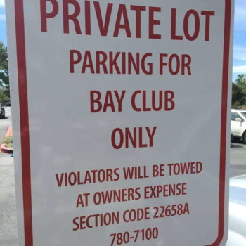 Signage for in front of parking space saying 