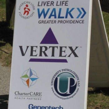 Plastic folding sign directing right to the Liver Left Walk
