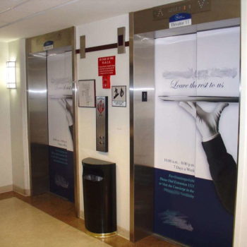 Elevator wraps of a waiter holding a tray