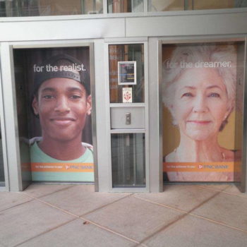 PNC bank elevator wraps of a man and a woman