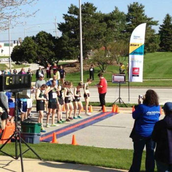 Starting line of a race with a flag banner