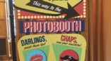 a point of purchase display banner for a photobooth