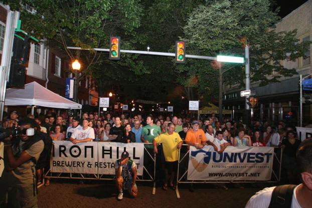Iron Hill Brewery and Univest banners at a concert