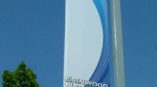 Erinwood New Car Alternative banner on a light post