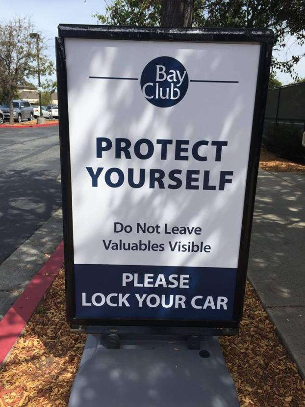 Bay Club Protect Yourself Please Lock Your Car signage