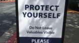 Bay Club Protect Yourself Please Lock Your Car signage