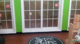 Save a life adopt floor graphic on wood tile