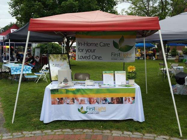 FirstLight Home Care event table toppers banner and tent