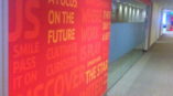 Wall graphic of words centered around positivity