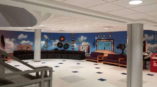 Wall mural of records televisions and radios