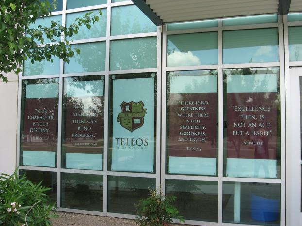 Teleos logo and quotes in window