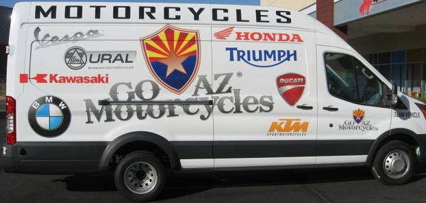 Go AZ Motorcycles van with multiple motorcycle brands on it