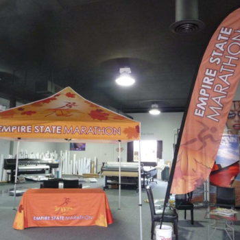 Autumn themed event tent table cover and flag banner for Empire State Marathon