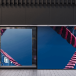 Decal of woman working out with red ropes on a wall. 